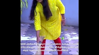 A Serial Actress Indian Malaysali Is Wearing An Indian Dress.
